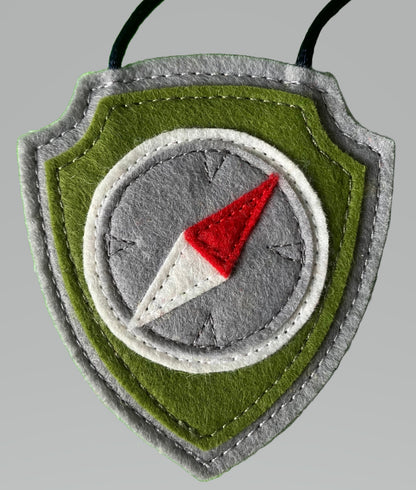 handmade felt paw patrol badges  with  symbols of characters on the badge